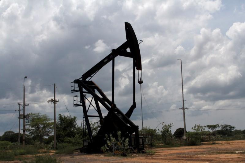Oil prices extend losses on supply, trade war fears