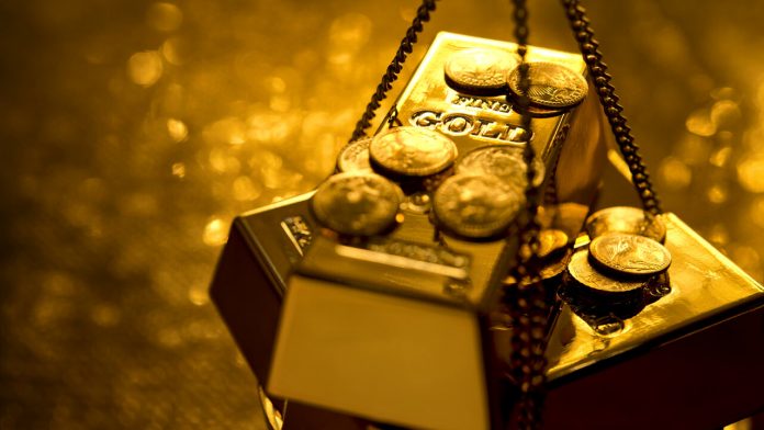 Gold retreats from seven-year highs