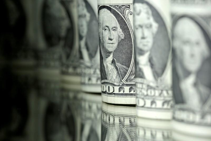 Dollar dips vs yen as investors reach for safe havens on virus scare