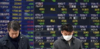 Asian shares and U.S. stock futures rose on Wednesday, as investors tried to shake off worries about the coronavirus epidemic after a slight decline in the number of new cases