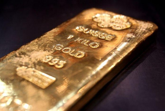A one kilo gold bar is displayed in a shop in Dubai's gold souk