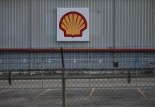 A sign is seen at a Shell facility near the Houston Ship Channel in Galena Park, Texas, U.S.