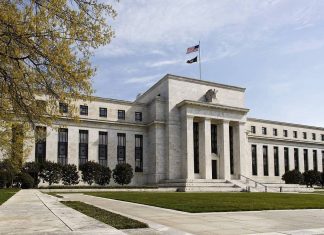 The U.S. Federal Reserve Bank Building, home to the Board of Governors of the Federal Reserve System, is seen in Washington, Friday, April 25, 2014. Often referred to as the Fed, it is the nations central banking system and sets monetary policy for the United States. (AP Photo/J. Scott Applewhite)