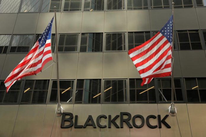 A sign for BlackRock Inc hangs above their building in New York U.S.