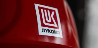 Lukoil company logo is pictured on a helmet at the Filanovskogo platform in Caspian Sea, Russia