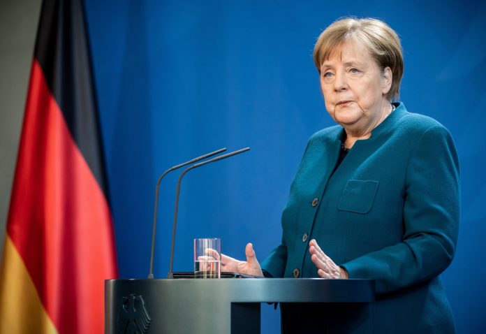 German Chancellor Angela Merkel makes a press statement on the spread of the new coronavirus COVID-19 at the Chancellery, in Berlin