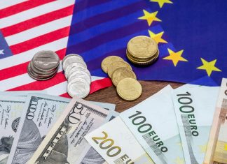 Dollars and euro with flag in table