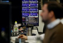 Global share markets dipped into the red on Wednesday as warnings of the worst global recession since the 1930s underlined the economic damage done during the coronavirus panemdic even as some countries try to re-open for business.