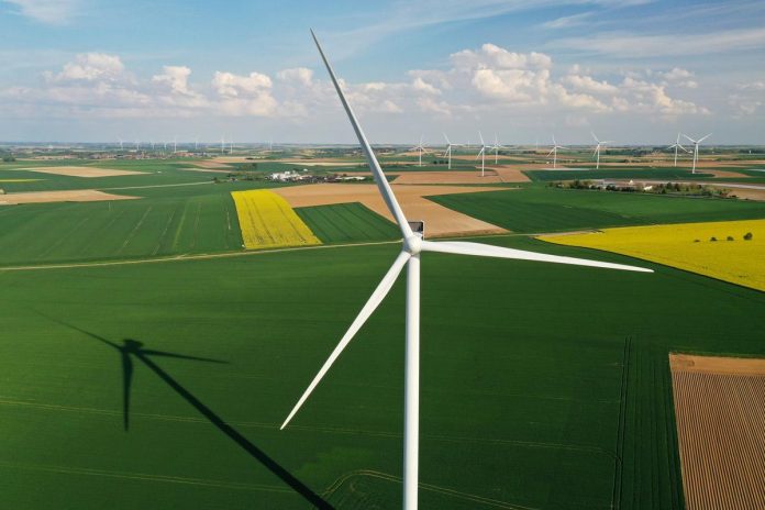 An aerial view shows power-generating windmill turbines in a wind farm in Graincourt-les-Havrincourt, France