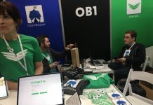 OB1 staff show off OpenBazaar at a 2019 conference.
