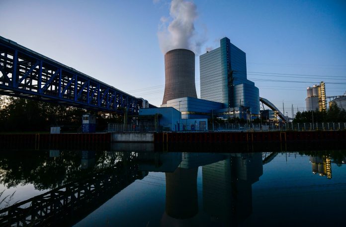 Smoke is coming out of the cooling tower of the coal-fired power plant Datteln 4 of Uniper in Datteln, western Germany
