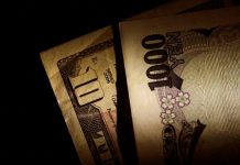 Japan Yen and U.S. Dollar notes are seen