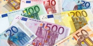 The euro held steady on Friday as an EU summit focused on a 750 billion euro recovery fund got underway, while geopolitical strains and fears of a second wave of COVID-19 cases set the dollar on track for its best weekly gain in a month.