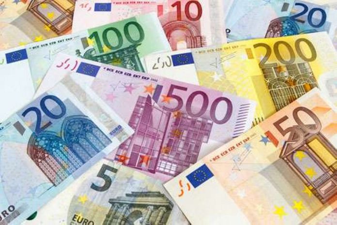 The euro held steady on Friday as an EU summit focused on a 750 billion euro recovery fund got underway, while geopolitical strains and fears of a second wave of COVID-19 cases set the dollar on track for its best weekly gain in a month.