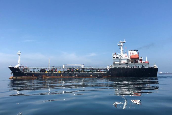 An oil tanker is seen in the sea outside the Puerto La Cruz oil refinery in Puerto La Cruz, Venezuela July