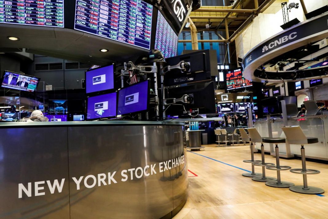 A nearly empty trading floor is seen as preparations are made for the return to trading at the New York Stock Exchange (NYSE) in New York, U.S., May